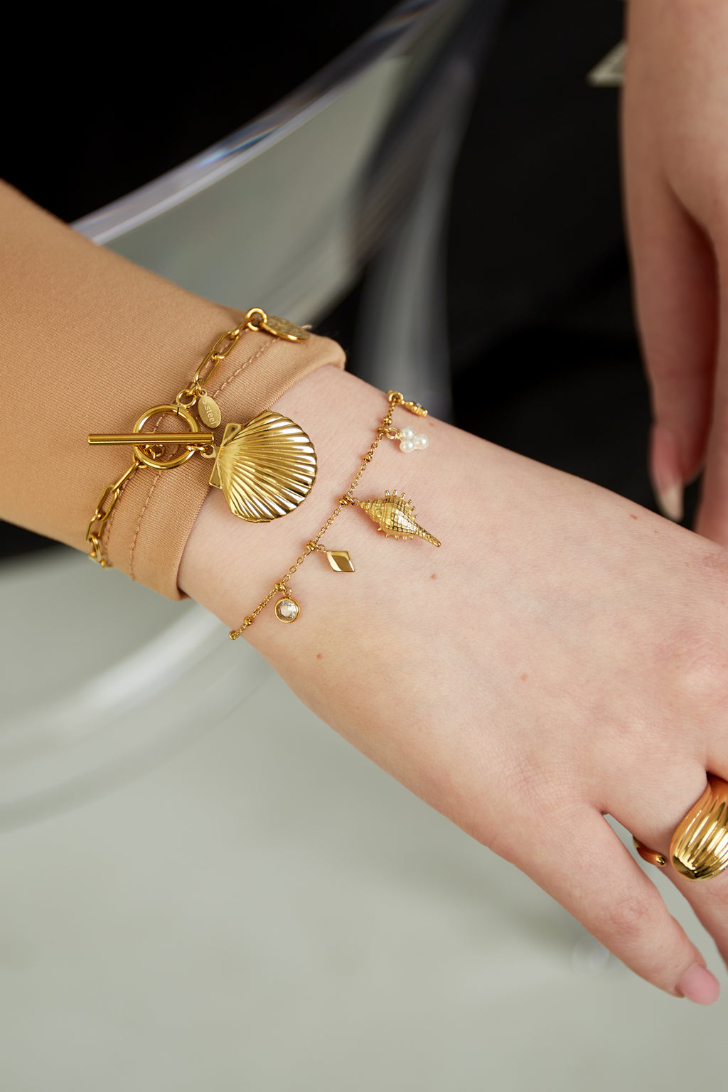 bracelet avec breloque coquillage