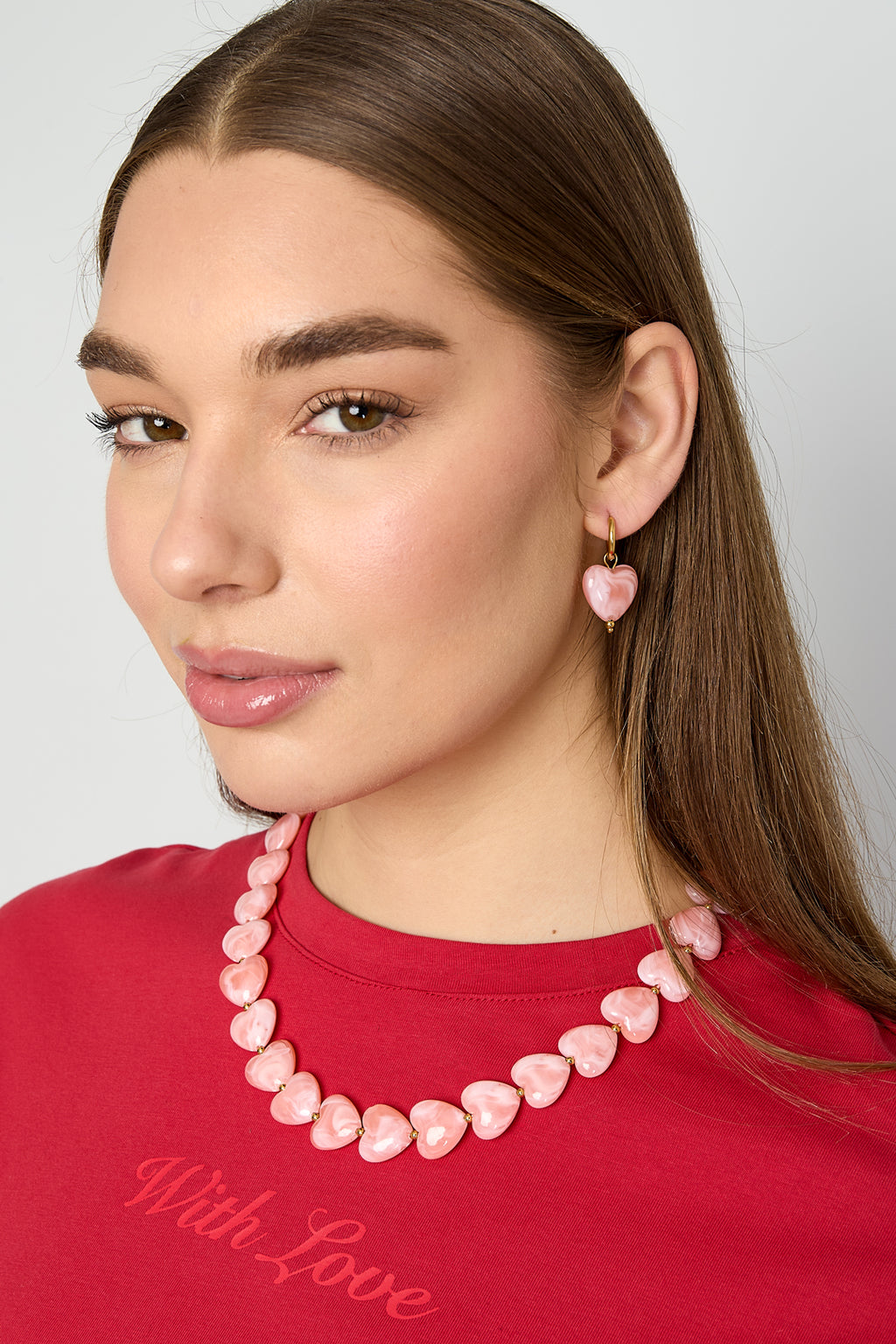 Boucles d'oreilles avec des perles en forme de cœur