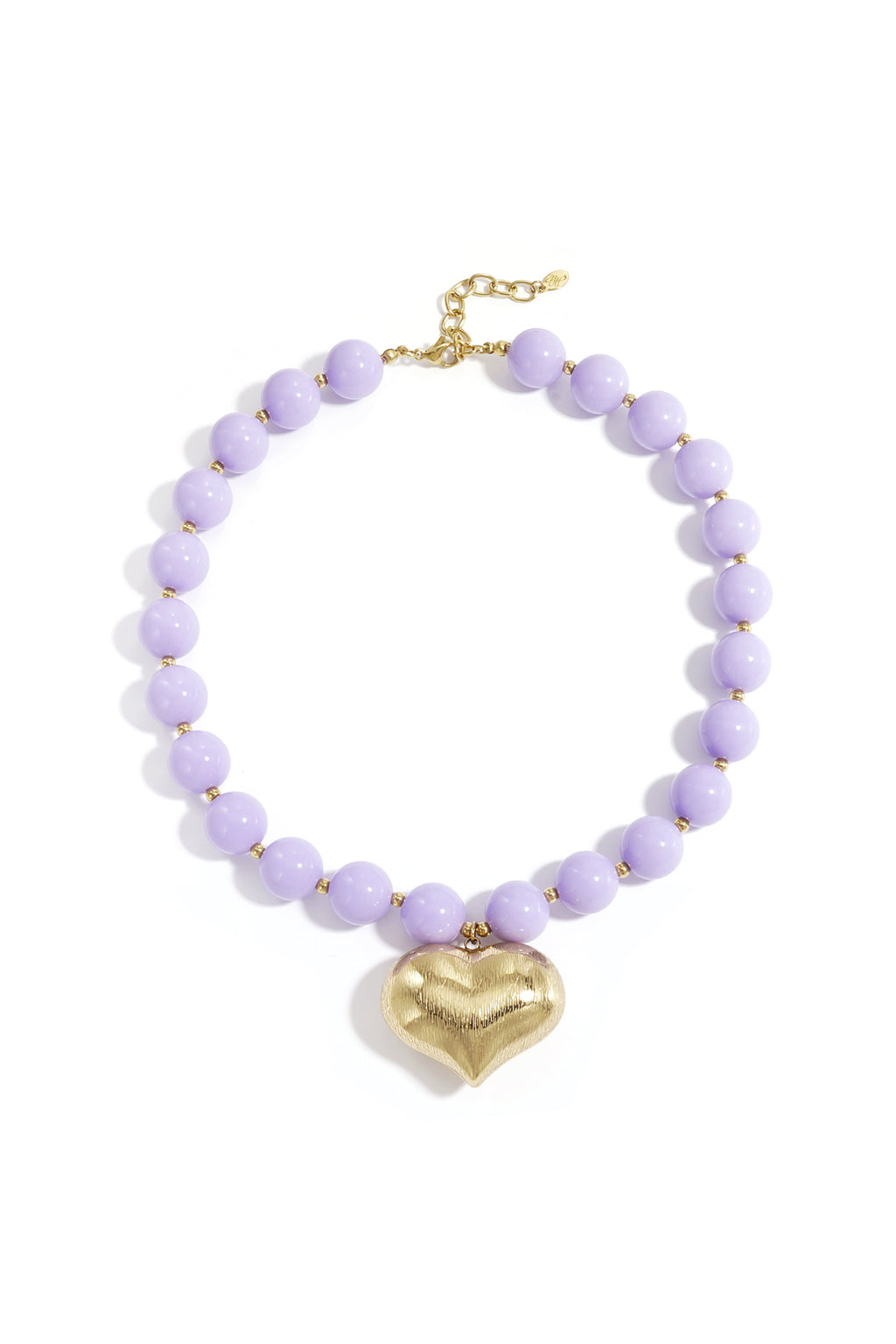 Collier de perles avec cœur suspendu