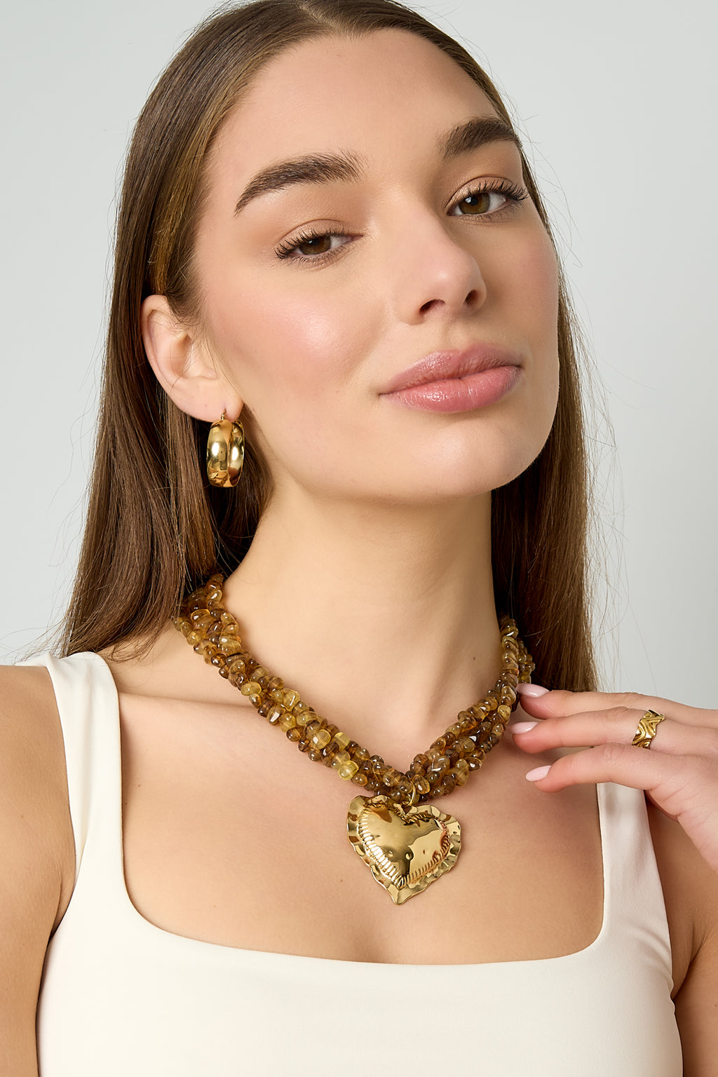 Colliers de perles entrelacées avec cœur suspendu