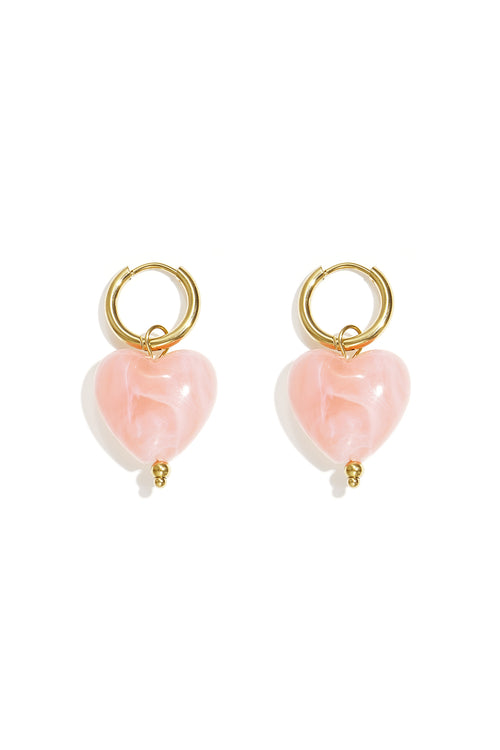 Boucles d'oreilles avec des perles en forme de cœur