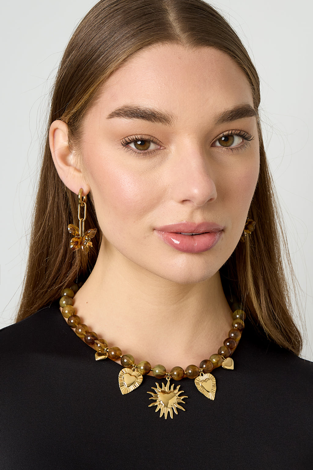 Collier de perles avec des breloques d'été