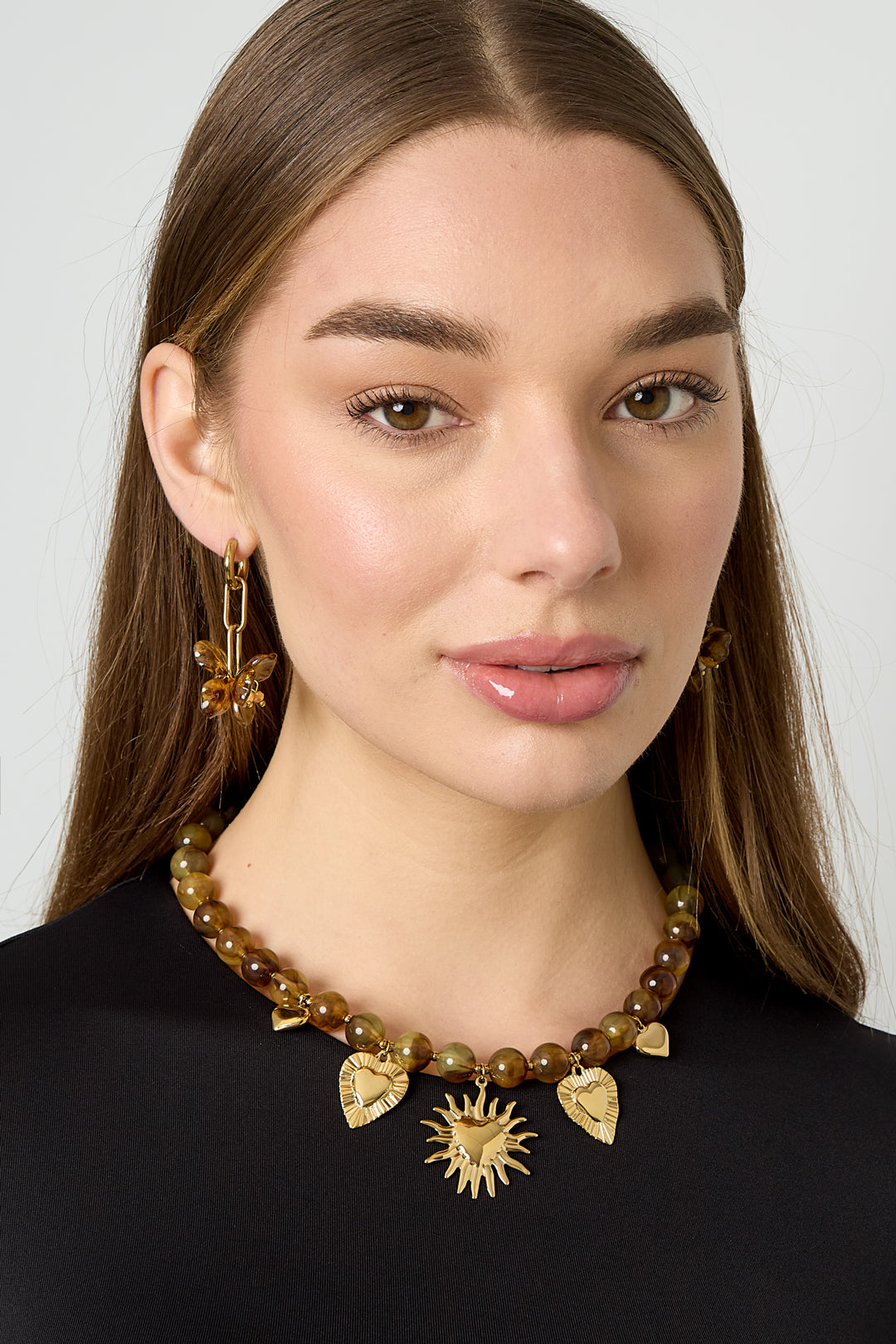 Collier de perles avec des breloques d'été