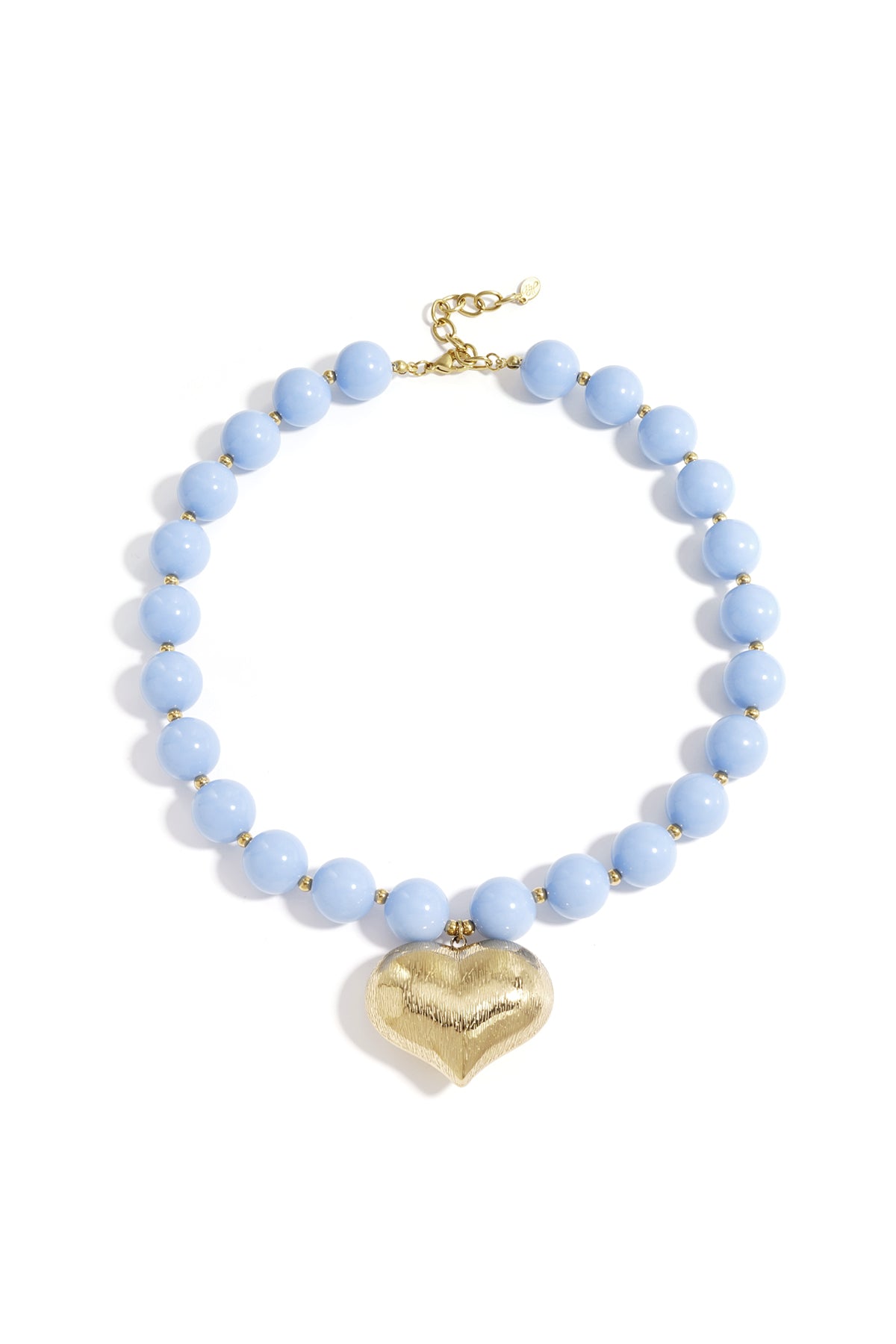 Collier de perles avec cœur suspendu